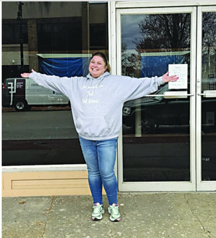 Michelle Mays pictured outside of her building for her non-profit FosterHub.